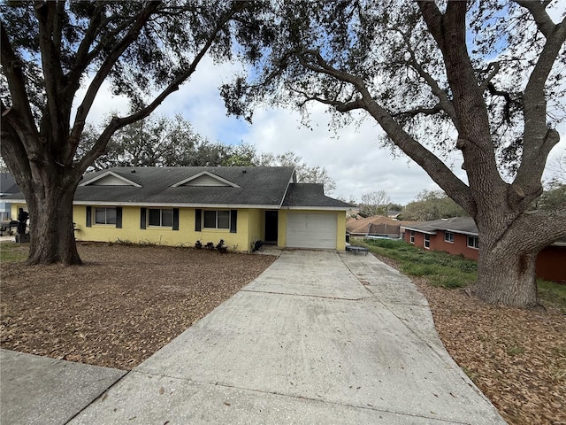 ranch-style home with a garage