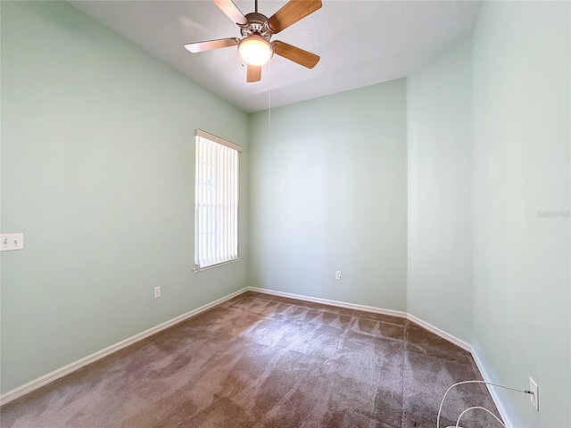 unfurnished room featuring carpet flooring and ceiling fan