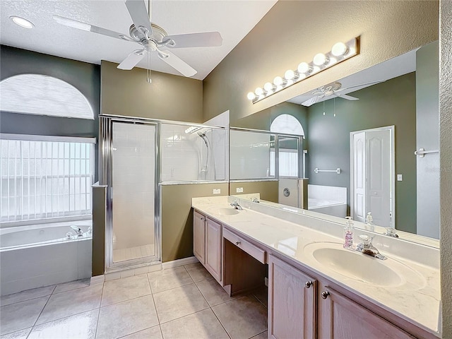 bathroom featuring vanity, separate shower and tub, tile patterned floors, and ceiling fan