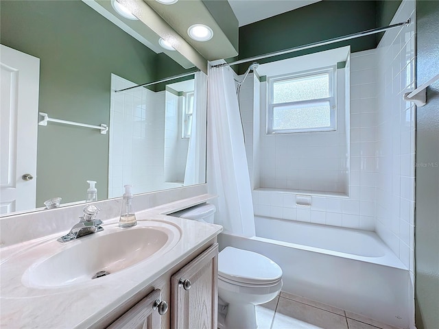 full bathroom featuring shower / bath combination with curtain, vanity, tile patterned floors, and toilet