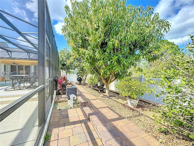 view of patio with a lanai