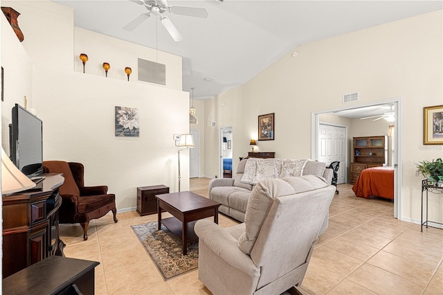 living area with visible vents, ceiling fan, and light tile patterned floors