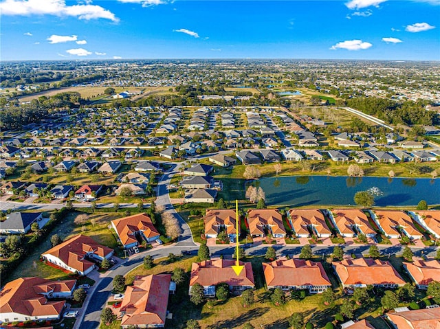 birds eye view of property featuring a residential view and a water view