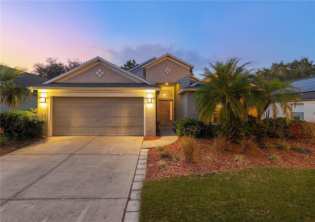 view of front of home featuring a garage