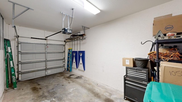 garage featuring a garage door opener