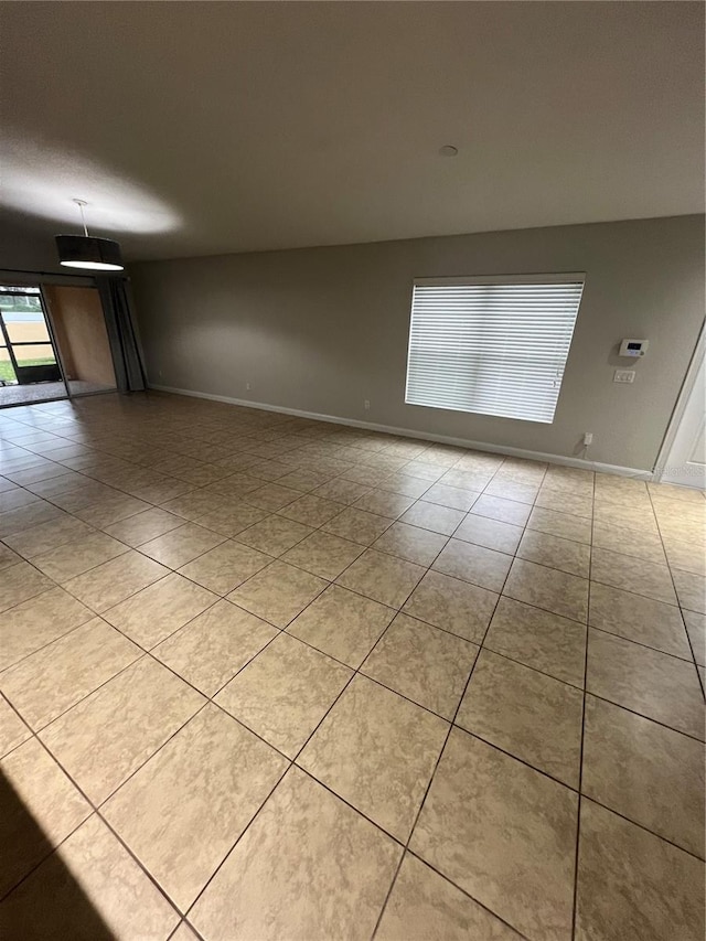 view of tiled spare room