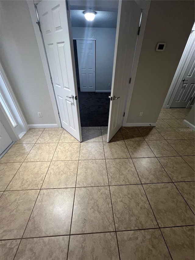 bathroom featuring tile patterned flooring