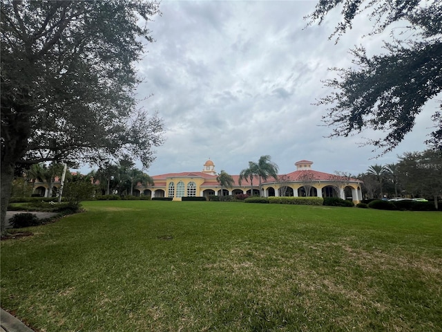 exterior space with a gazebo and a lawn