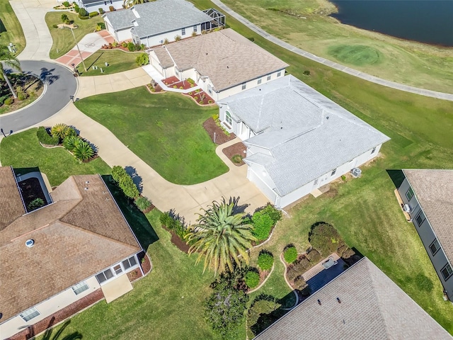 birds eye view of property with a residential view