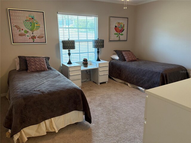 1152 Villa Ln Unit 104, Apopka, FL 32712 - carpeted bedroom featuring crown molding