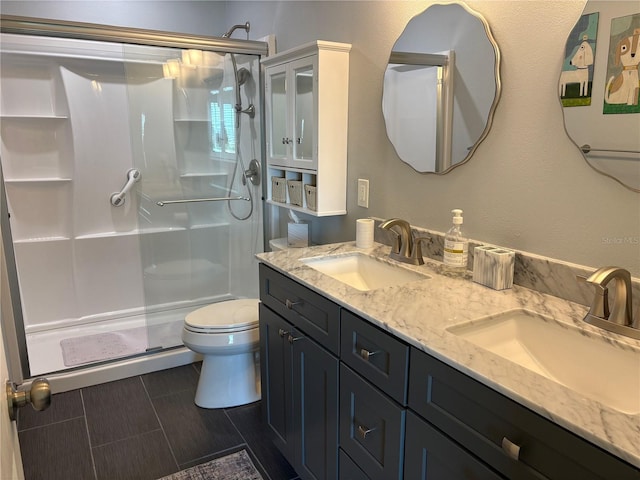 1152 Villa Ln Unit 104, Apopka, FL 32712 - bathroom with vanity, toilet, and a shower with door