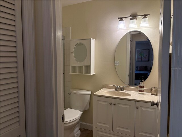 1152 Villa Ln Unit 104, Apopka, FL 32712 - bathroom featuring vanity and toilet