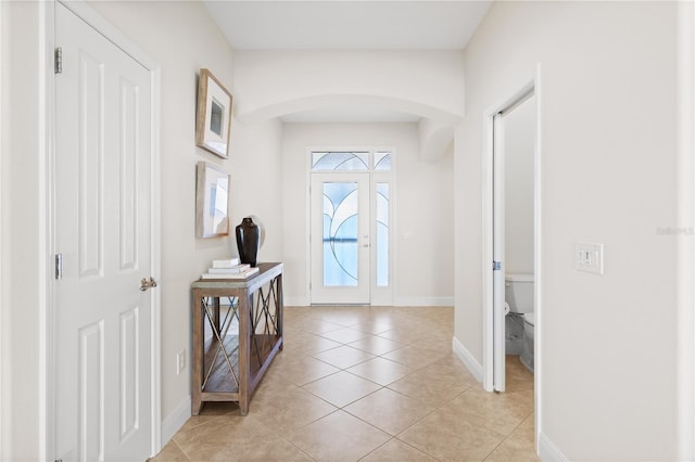 entrance foyer featuring light tile patterned floors