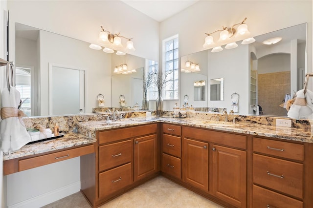 bathroom featuring tile patterned floors and vanity