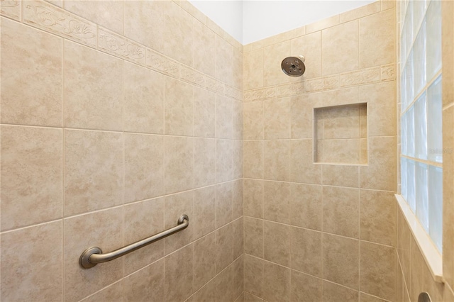 details featuring a tile shower