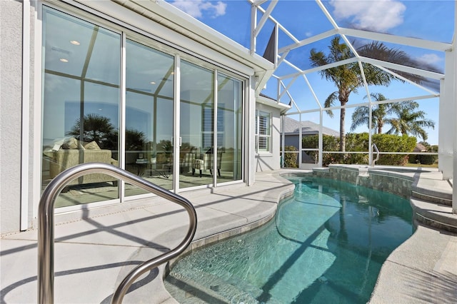 view of swimming pool featuring a patio area and glass enclosure