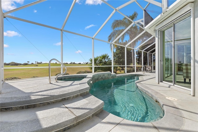 view of swimming pool with a patio area and glass enclosure