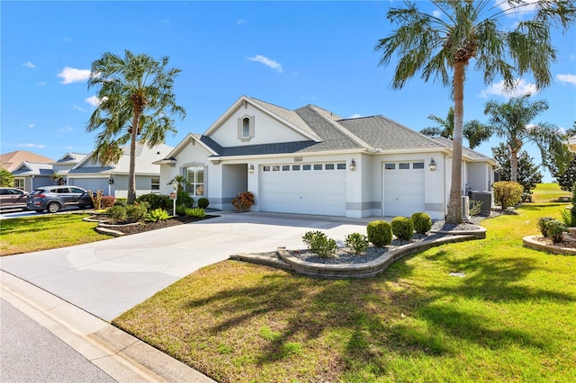 ranch-style home featuring a garage, central AC, and a front yard