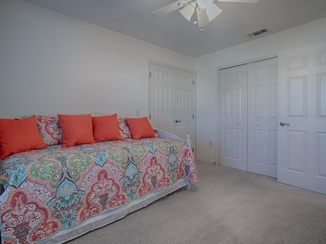 bedroom with ceiling fan and carpet flooring