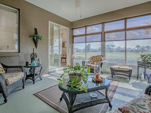 sunroom / solarium featuring a healthy amount of sunlight