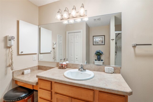 8373 SE 177th Bartram Loop, The Villages, FL 32162 - bathroom with vanity, a shower, and toilet