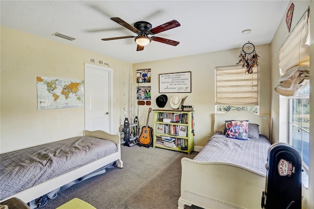 carpeted bedroom featuring ceiling fan