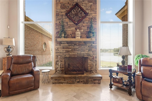 living room featuring a fireplace