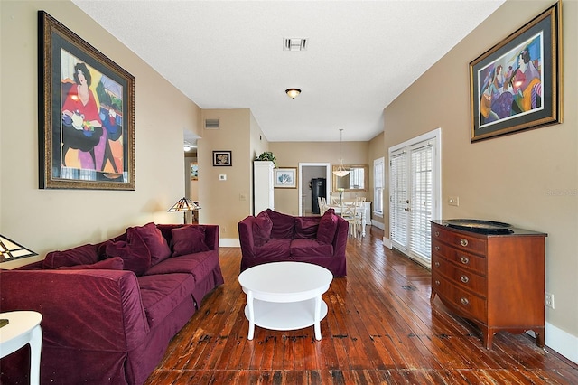 living room with dark wood-type flooring