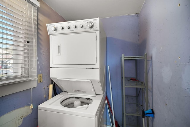 washroom with stacked washer and dryer