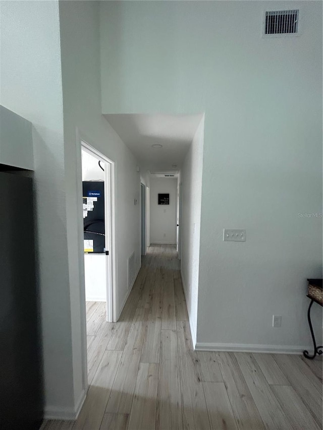 654 NW 9th Ave, Webster, FL 33597 - hall featuring light wood-style flooring