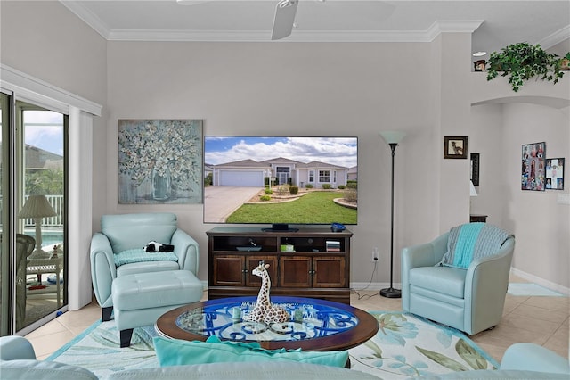 living area featuring ceiling fan, ornamental molding, and light tile patterned flooring