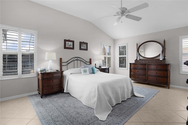 bedroom with lofted ceiling, ceiling fan, and light tile patterned floors