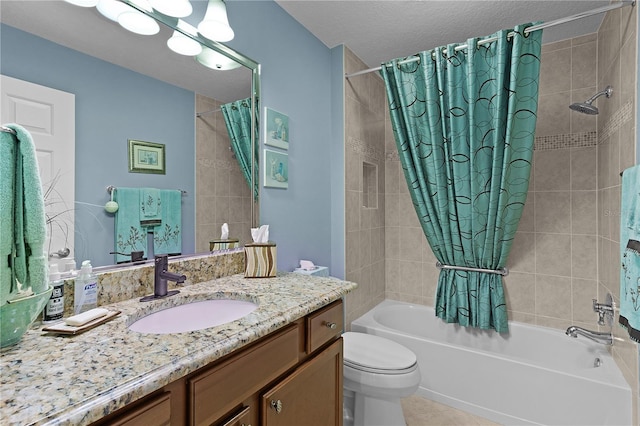 full bathroom featuring vanity, shower / bath combination with curtain, a textured ceiling, tile patterned flooring, and toilet