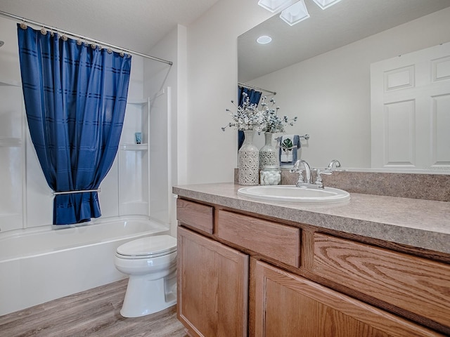 full bathroom featuring shower / bath combination with curtain, wood-type flooring, toilet, and vanity