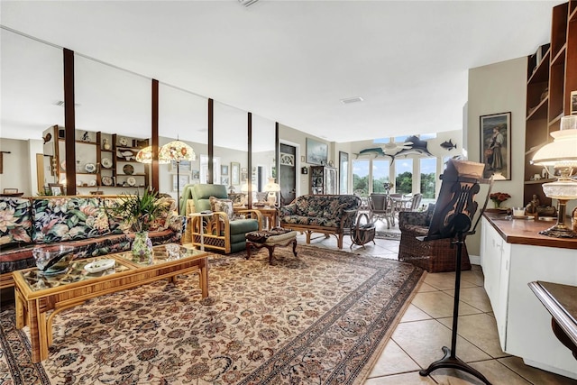 living room with light tile patterned floors