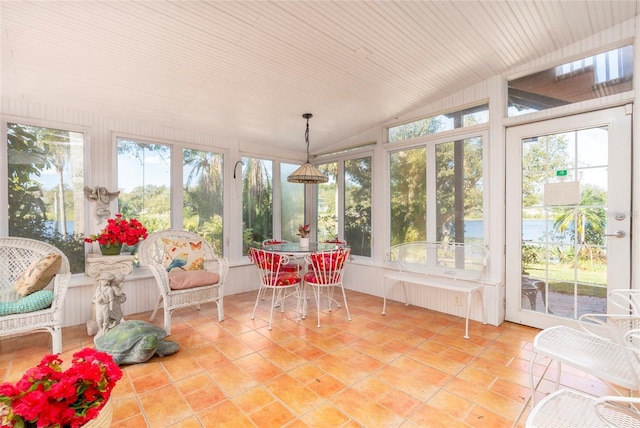 sunroom / solarium with lofted ceiling