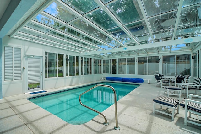 view of swimming pool with a patio