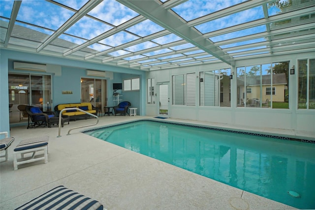 view of swimming pool featuring a patio and a wall mounted air conditioner