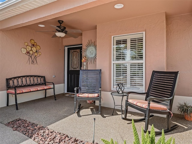 view of patio featuring ceiling fan