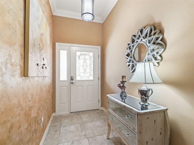 tiled foyer with ornamental molding