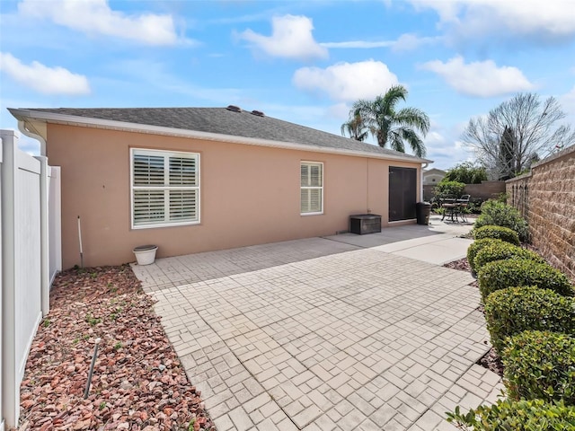 rear view of house with a patio area