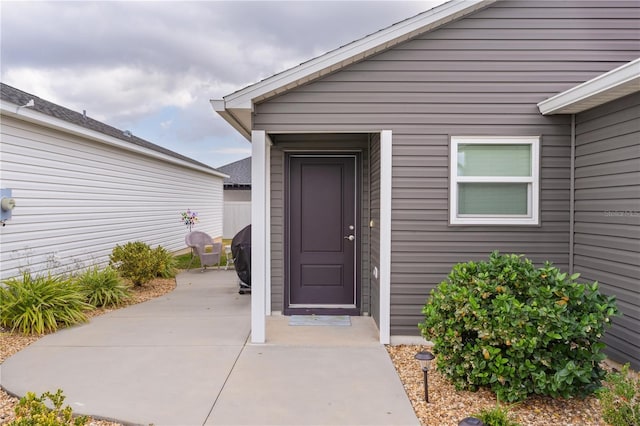 property entrance with a patio