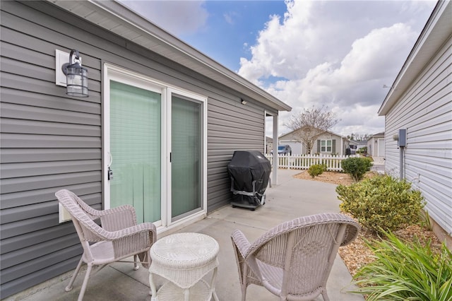 view of patio / terrace with a grill