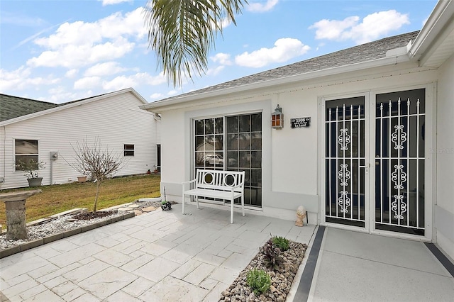 property entrance with a patio area