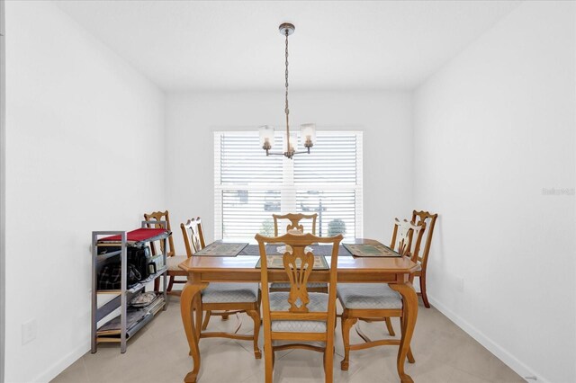 1392 Kenneth St, The Villages, FL 34762 - dining space with a notable chandelier