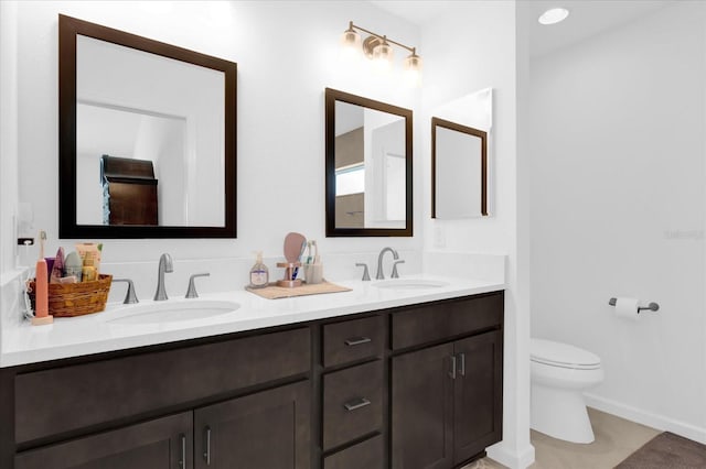 1392 Kenneth St, The Villages, FL 34762 - bathroom with vanity, tile patterned flooring, and toilet
