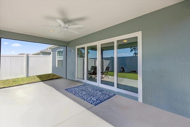 1392 Kenneth St, The Villages, FL 34762 - unfurnished sunroom with ceiling fan