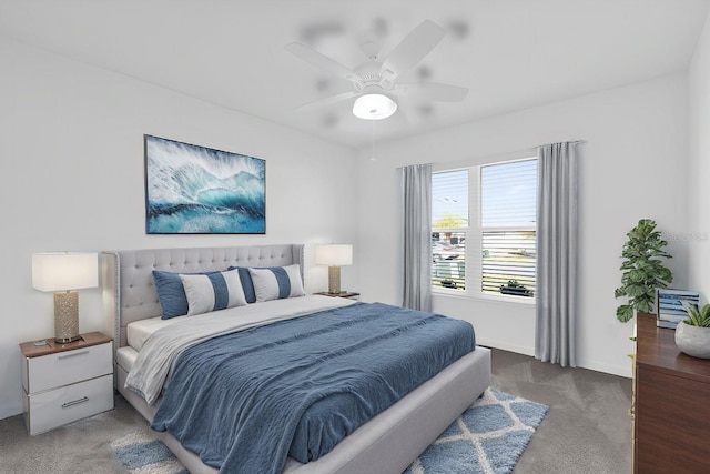 1392 Kenneth St, The Villages, FL 34762 - bedroom with ceiling fan and dark colored carpet