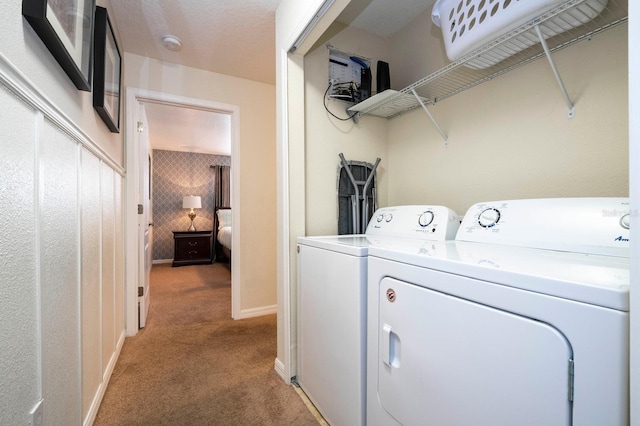 washroom with light carpet and independent washer and dryer