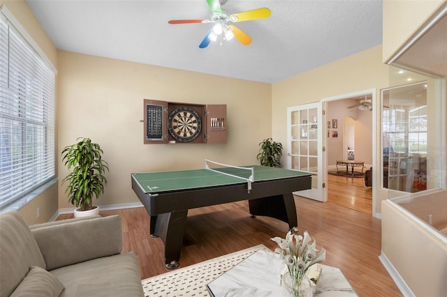 playroom featuring ceiling fan, billiards, light wood-type flooring, and french doors